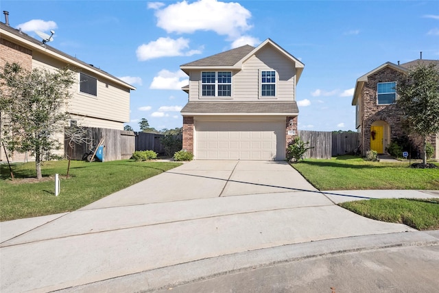 front facade featuring a garage and a front lawn