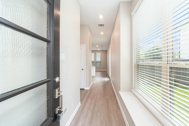 hall featuring light wood-type flooring