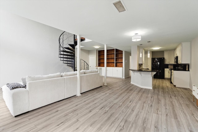 living room with light wood-type flooring