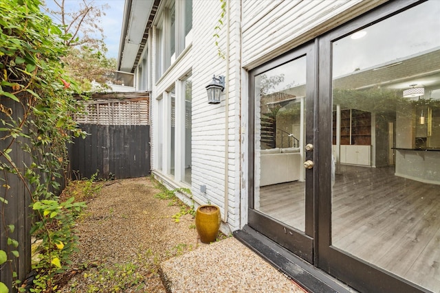 view of side of home with a deck