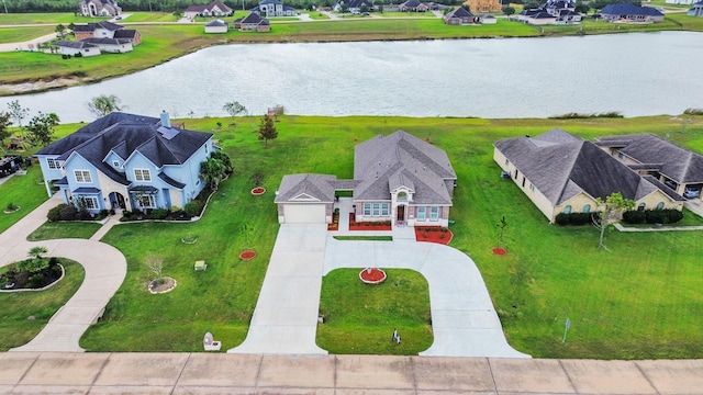 bird's eye view with a water view