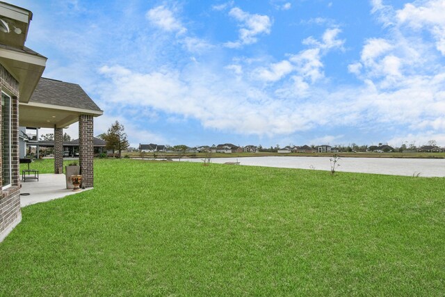 view of yard with a water view