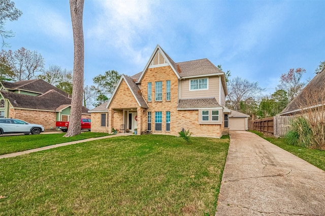 view of front of home featuring a front lawn and a garage