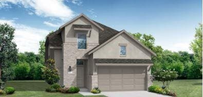 view of front facade with a garage and a front yard