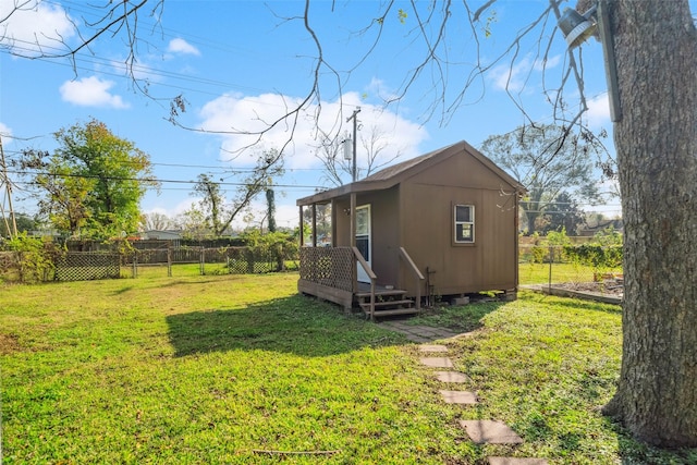 view of side of property featuring a lawn