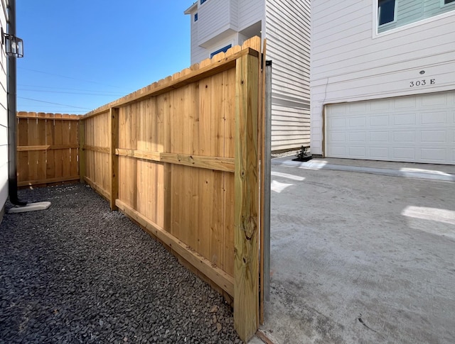 view of yard featuring a garage