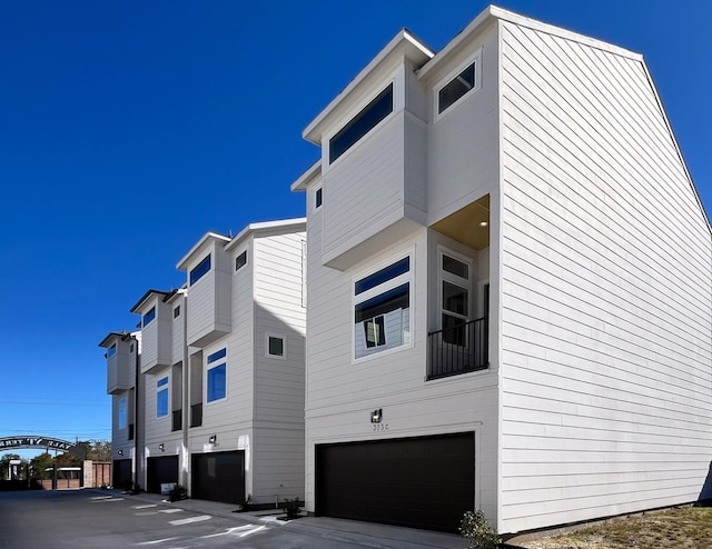 view of building exterior with a garage