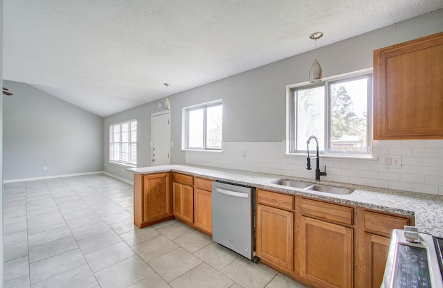 kitchen with pendant lighting, backsplash, sink, stainless steel dishwasher, and light tile patterned floors