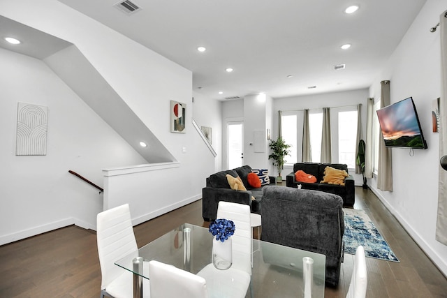 living room featuring dark hardwood / wood-style flooring