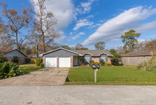 ranch-style home featuring a garage and a front lawn