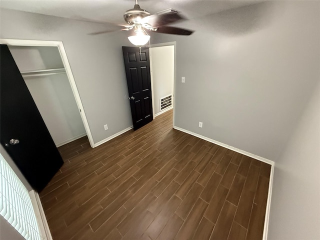 unfurnished bedroom featuring a closet and ceiling fan