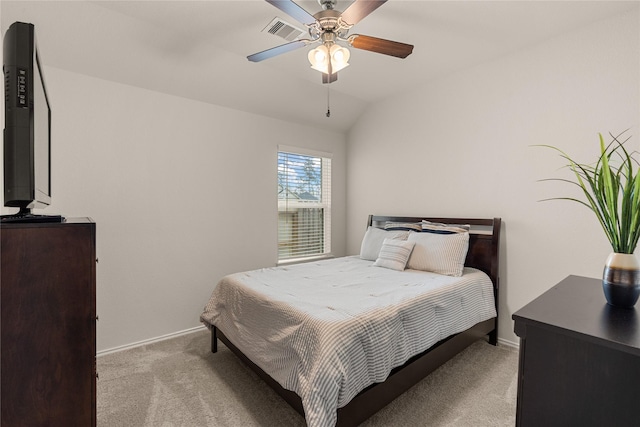 bedroom with light carpet, ceiling fan, and lofted ceiling