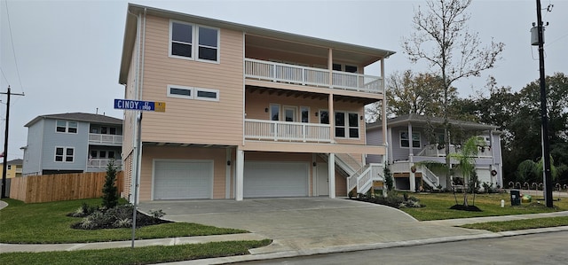 view of front of house with a garage and a front yard