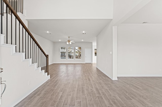 foyer featuring light hardwood / wood-style floors and ceiling fan