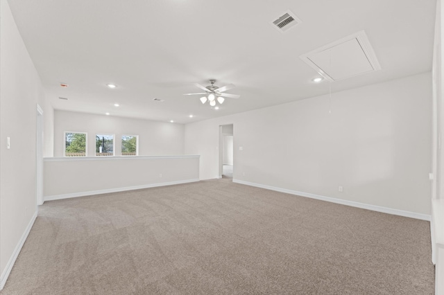 spare room with light colored carpet