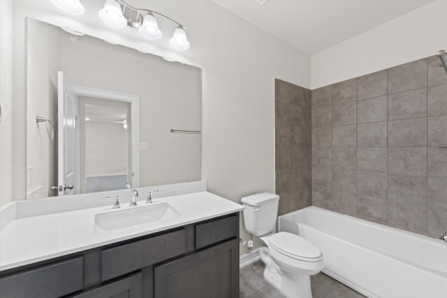 full bathroom with tiled shower / bath combo, vanity, tile patterned flooring, and toilet