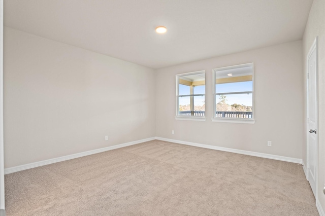 view of carpeted spare room