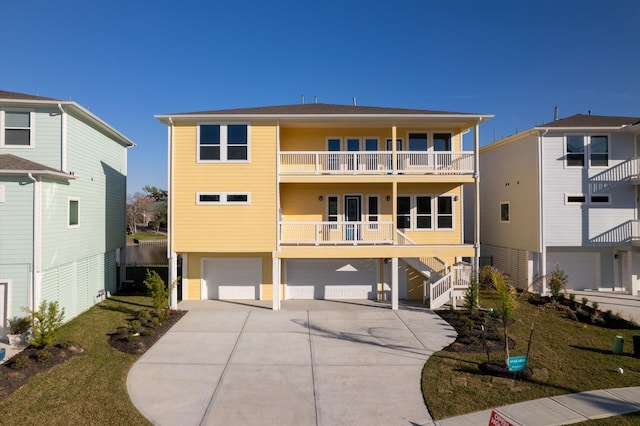 back of property featuring a garage and a balcony