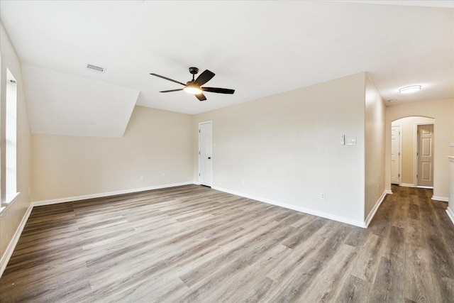 empty room with light wood-type flooring and ceiling fan