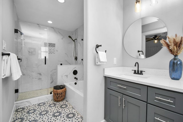 bathroom featuring tile patterned floors, ceiling fan, vanity, and independent shower and bath