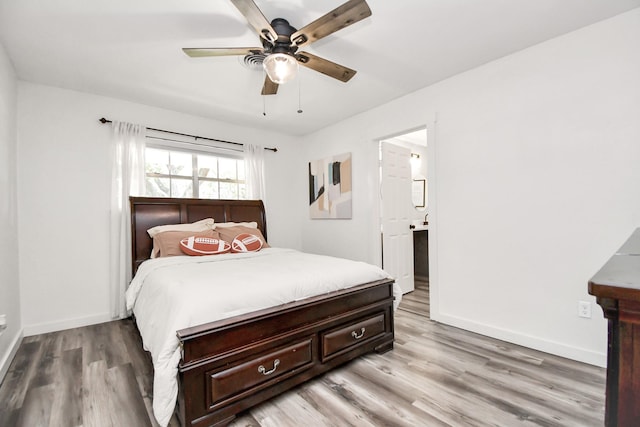 bedroom with ceiling fan and light wood-type flooring