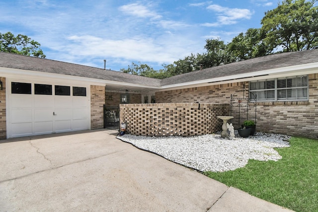 view of side of property featuring a garage