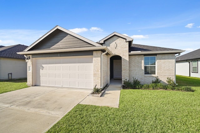 ranch-style home featuring a front yard and a garage