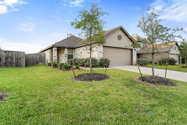 14519 Broadbury Pond Rd, Rosharon, TX 77583 - view of front of home featuring driveway, brick siding, an attached garage, and a shingled roof