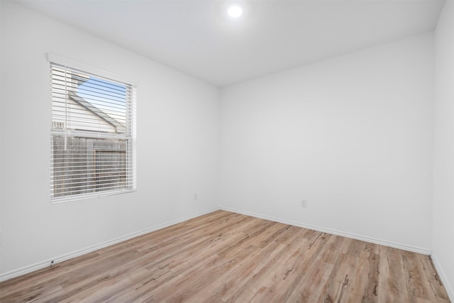 14519 Broadbury Pond Rd, Rosharon, TX 77583 - unfurnished room featuring light wood-type flooring and baseboards