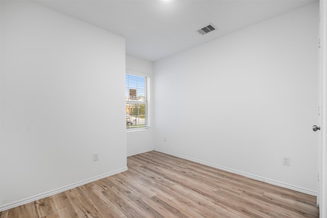 14519 Broadbury Pond Rd, Rosharon, TX 77583 - empty room featuring light wood-style floors and baseboards