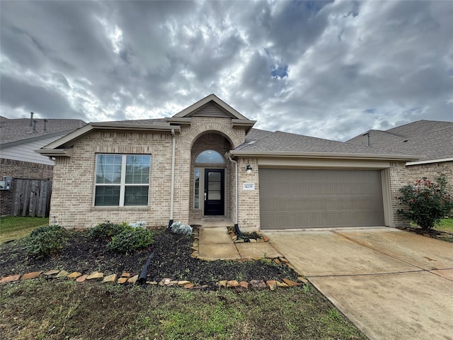 view of front of home with a garage