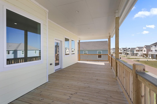 22805 Miramar Dr, Galveston, TX 77554 - wooden deck with a residential view