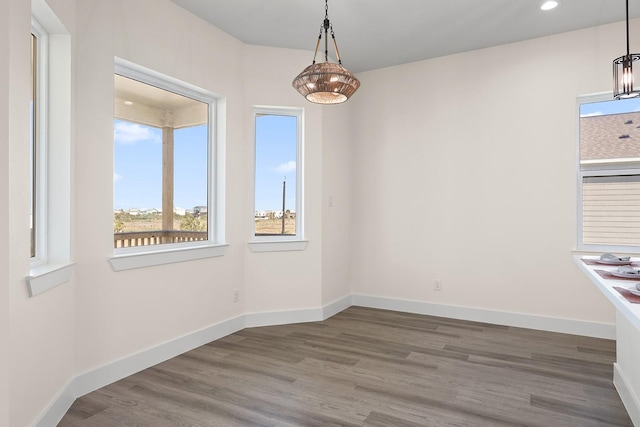 22805 Miramar Dr, Galveston, TX 77554 - unfurnished dining area with plenty of natural light, wood finished floors, and recessed lighting