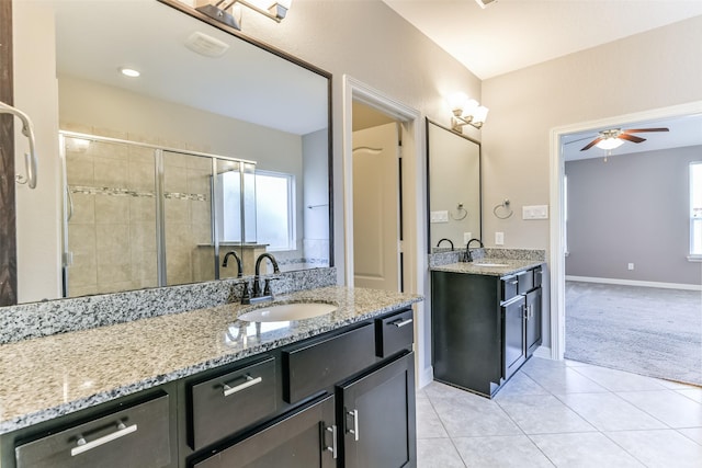 bathroom with ceiling fan, tile patterned flooring, plenty of natural light, and vanity