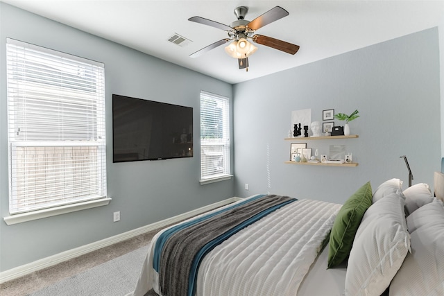 bedroom featuring ceiling fan and carpet flooring