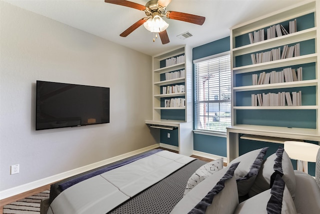 bedroom featuring ceiling fan and wood-type flooring