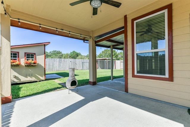 view of patio / terrace featuring ceiling fan