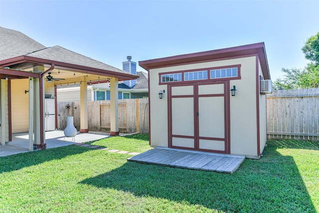 view of outdoor structure featuring a lawn