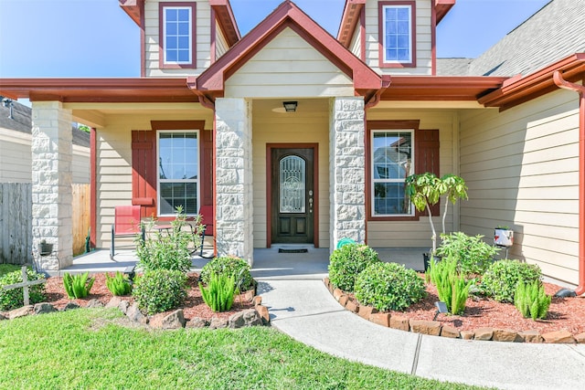 property entrance featuring covered porch