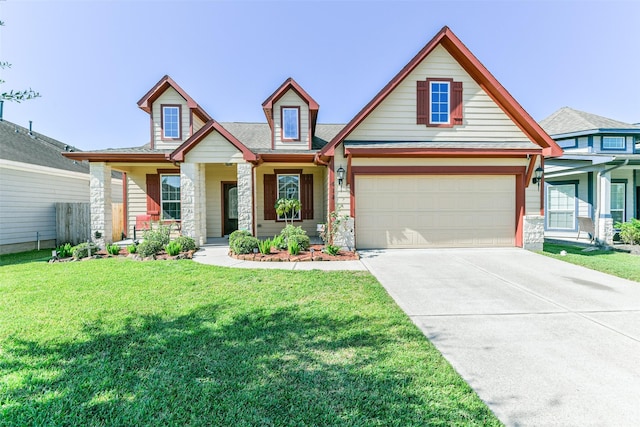 craftsman house with a front lawn, a garage, and covered porch