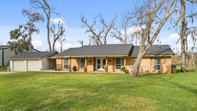 ranch-style home featuring a front yard, an attached garage, fence, and driveway