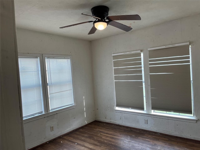 unfurnished room featuring a ceiling fan and wood finished floors