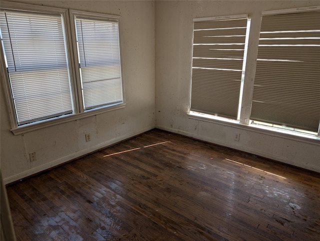 empty room featuring hardwood / wood-style floors