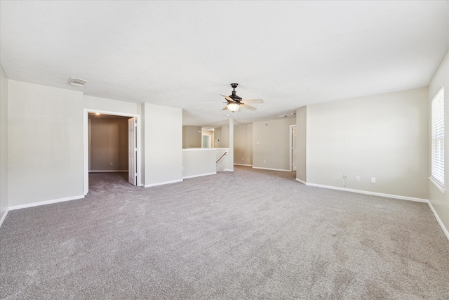 unfurnished room featuring carpet flooring and ceiling fan