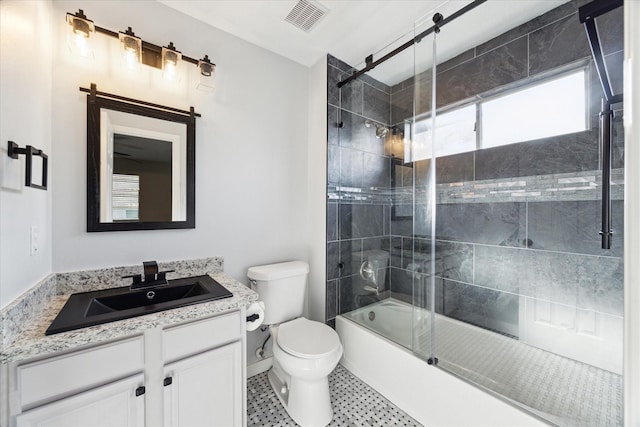 full bathroom with vanity, toilet, and enclosed tub / shower combo