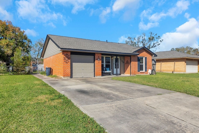 single story home featuring a garage and a front lawn