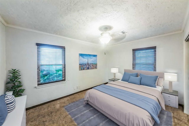 bedroom featuring crown molding, ceiling fan, carpet flooring, and a textured ceiling