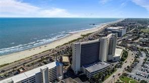 drone / aerial view with a view of the beach and a water view