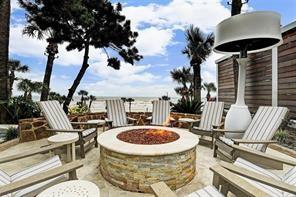 view of patio / terrace with a fire pit