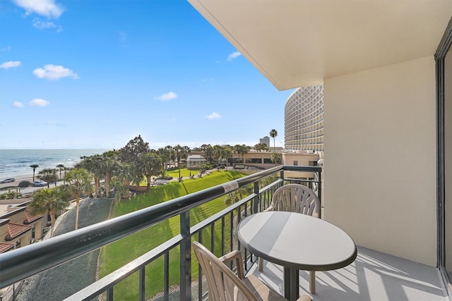 balcony featuring a water view